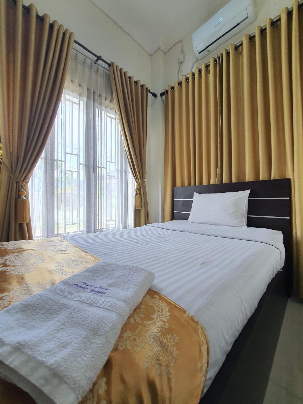 Mahakam Guest House بادانج الغرفة الصورة